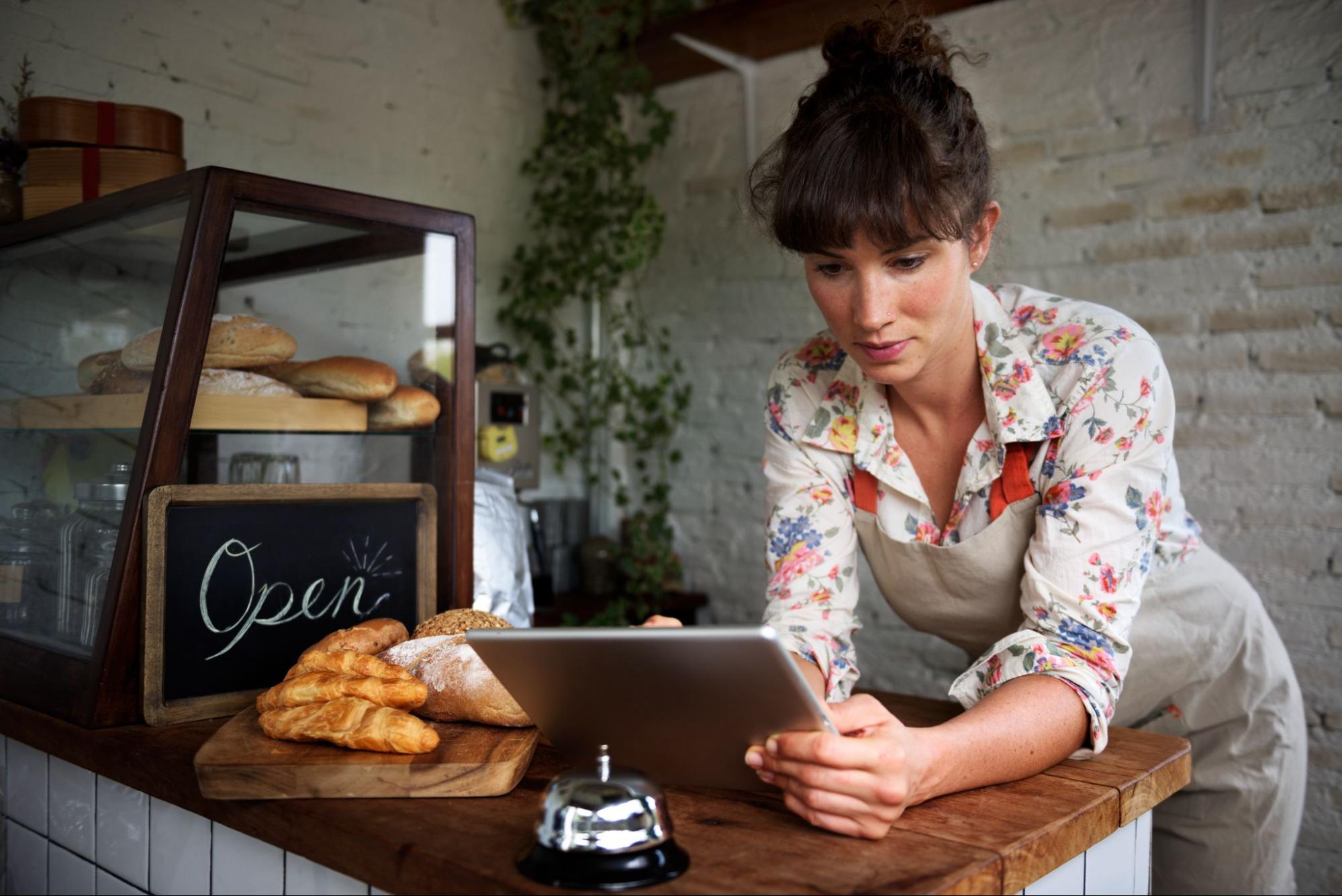 Image of a small business owner figuring out how to be successful.