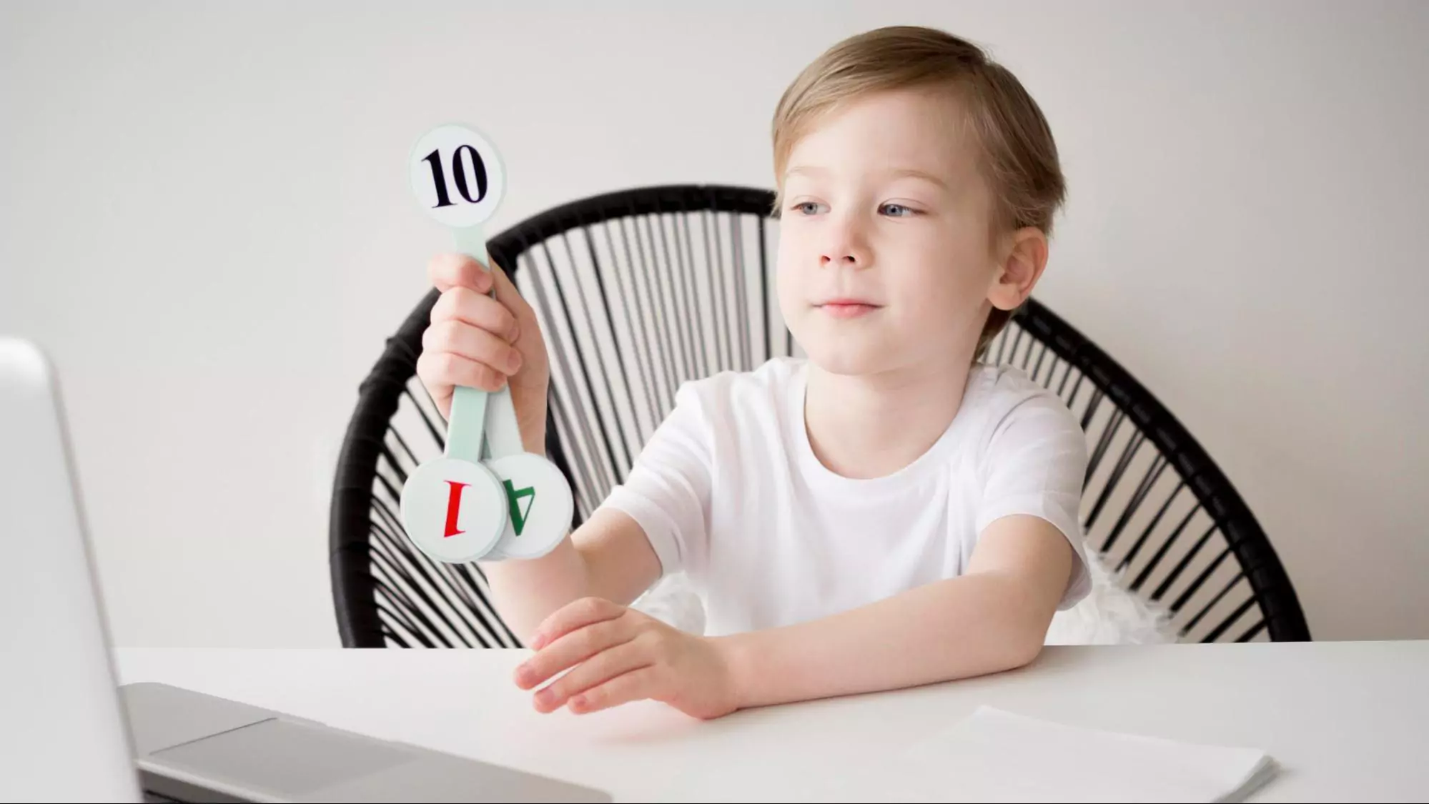 An image of a boy engaging with numbers and developing his time management skills.