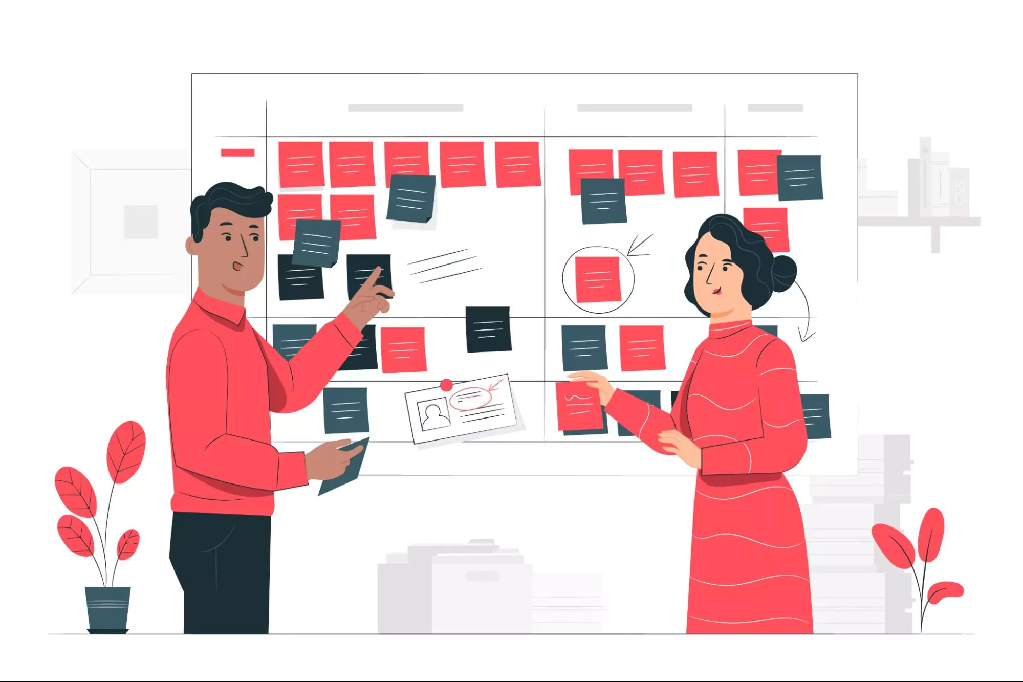 A man and woman discuss kanban project management in front of a whiteboard filled with colorful sticky notes.